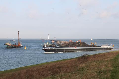 Inland barge using the Breeddiep Channel with widening work continuing beyond (Peter Barker)
